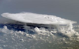 Illustration for article titled Looking Down at Clouds in the Sky